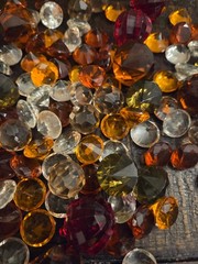 14+ oz of plastic simulated gem stones. Multi-colored.