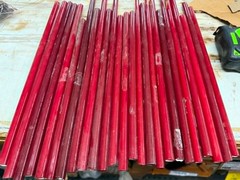 Sticks of Ruby Red neon glass tubing