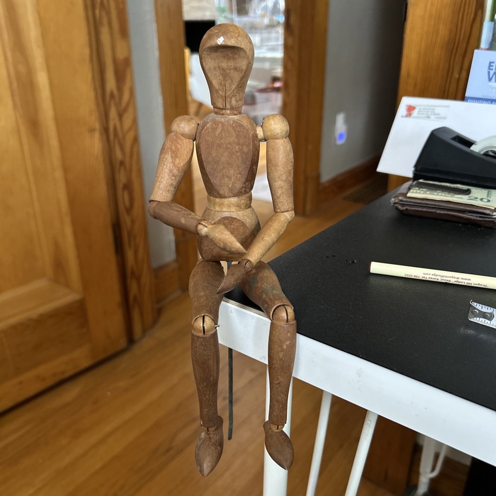 Vintage Dark Brown Wood Articulated Artists Figure. Approximately 12” Tall.