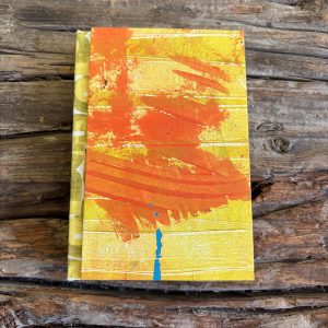 orange skies small lined notebook